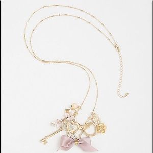 NWT gold-tone station charm necklace